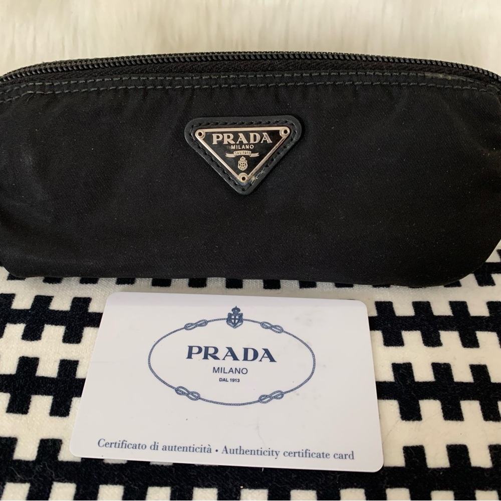 PRADA - Vela Cosmetic bag. Used. Good condition outside/makeup marks inside.